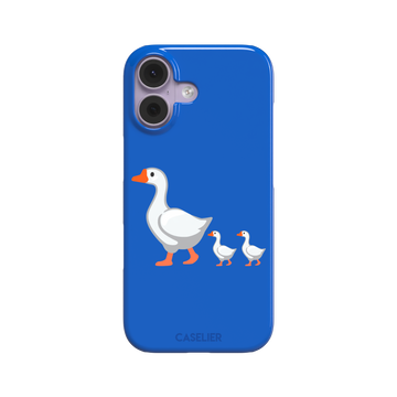 Royal blue phone case with a cartoon mother goose and two goslings walking in a line, emoji-style illustration with white birds and orange beaks and feet, phone case by Caselier — snap case, front view