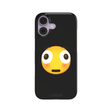 Moments Before Disaster phone case featuring a large flushed emoji face with wide eyes and rosy cheeks on a matte black background, phone case by Caselier — snap case, front view