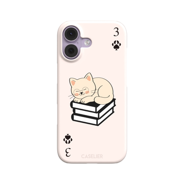 Three of Spades phone case in blush pink with a sleepy illustrated cat resting on stacked books and paw print spade symbols at each corner, by Caselier — snap case, front view