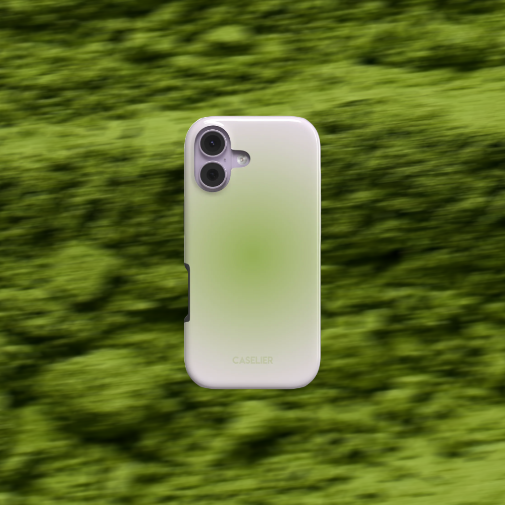 A light green gradient phone case with a subtle sheen, featuring a dual-camera cutout and caselier written near the bottom, set against a blurred green background.