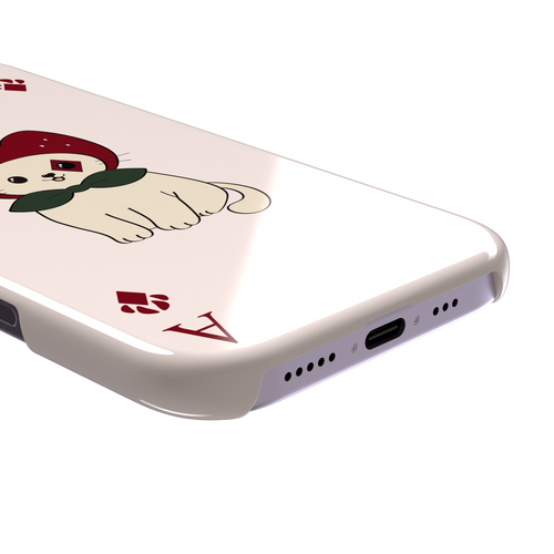 Ace of Diamonds phone case in blush pink with a kawaii cream cat wearing a crimson hood and green bow tie, Ace and paw-print diamond suit symbols at each corner, from the Paw Decks collection — snap case, charging port detail