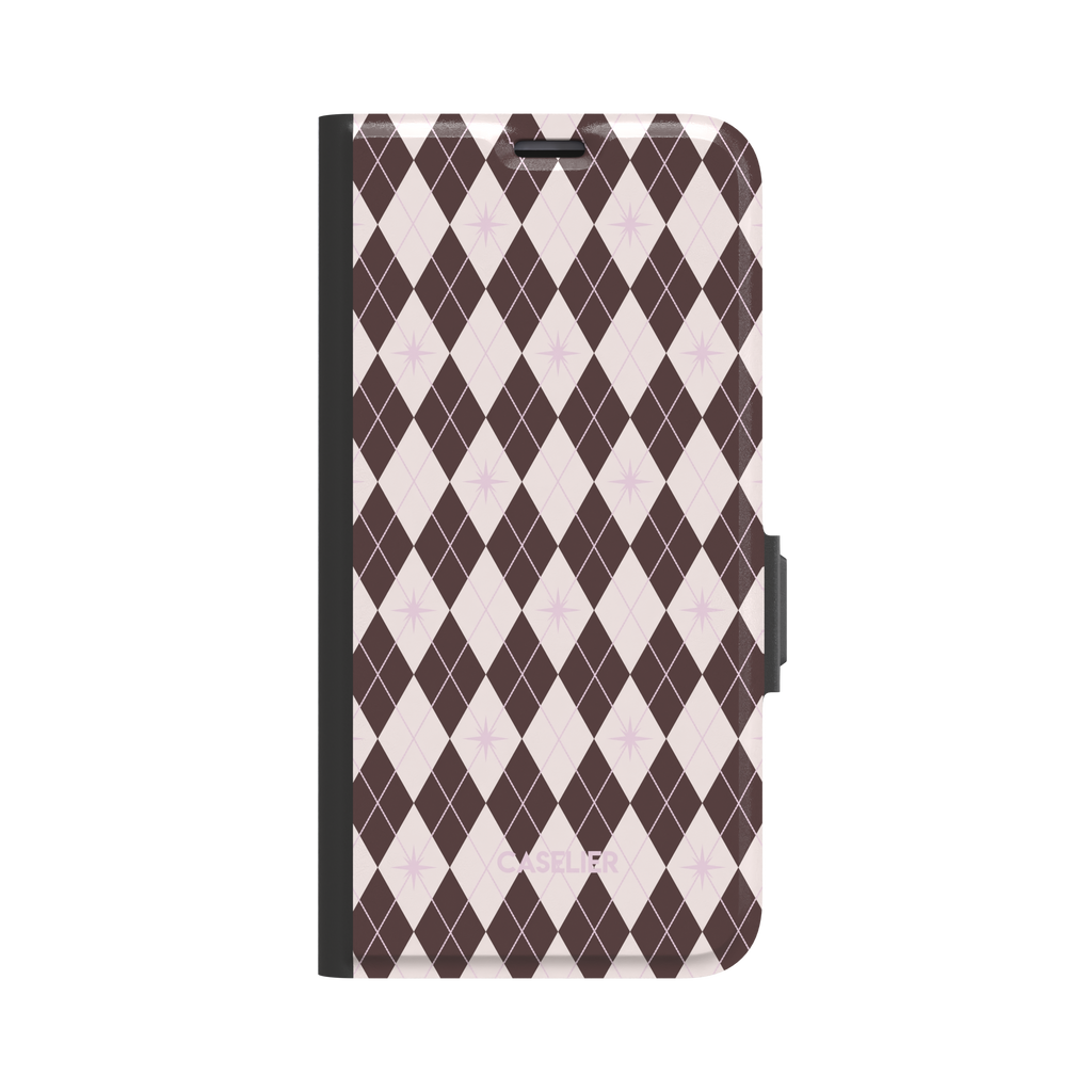 Argyle Starred folio wallet case in brown and blush pink argyle with lilac starbursts, shown in a three-quarter angle view with black spine and magnetic side clasp, phone case by Caselier - wallet case, front view | Caselier