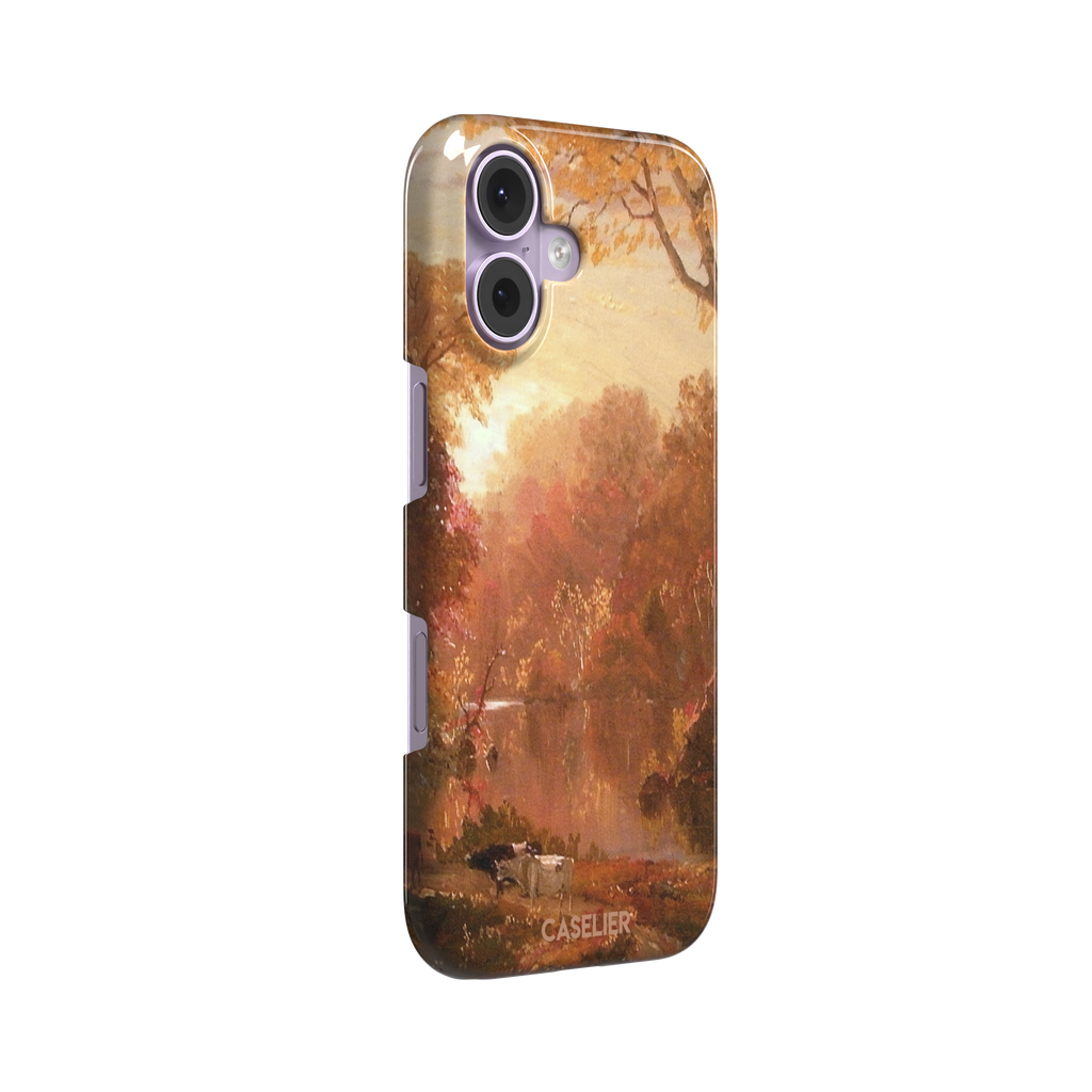 Autumn in North America by Frederic Edwin Church phone case showing a golden amber and rose-toned fall forest landscape with a still river reflection and cattle on the bank, phone case by Caselier — snap case, left view