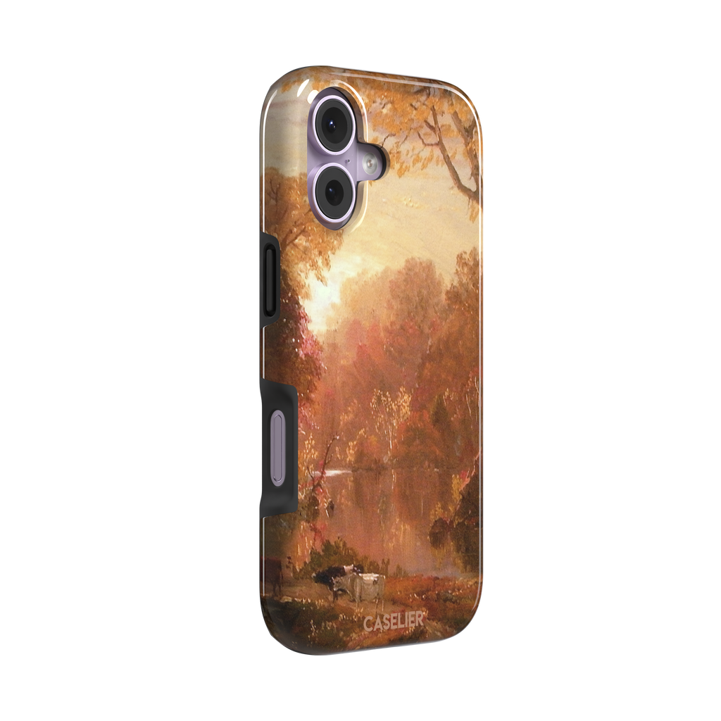 Autumn in North America by Frederic Edwin Church phone case showing a golden amber and rose-toned fall forest landscape with a still river reflection and cattle on the bank, phone case by Caselier — tough case, left view