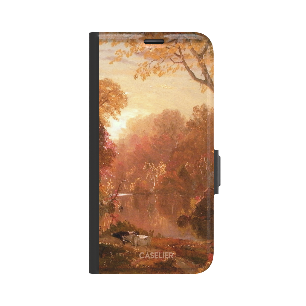 Autumn in North America by Frederic Edwin Church phone case showing a golden amber and rose-toned fall forest landscape with a still river reflection and cattle on the bank, phone case by Caselier — wallet case, front view