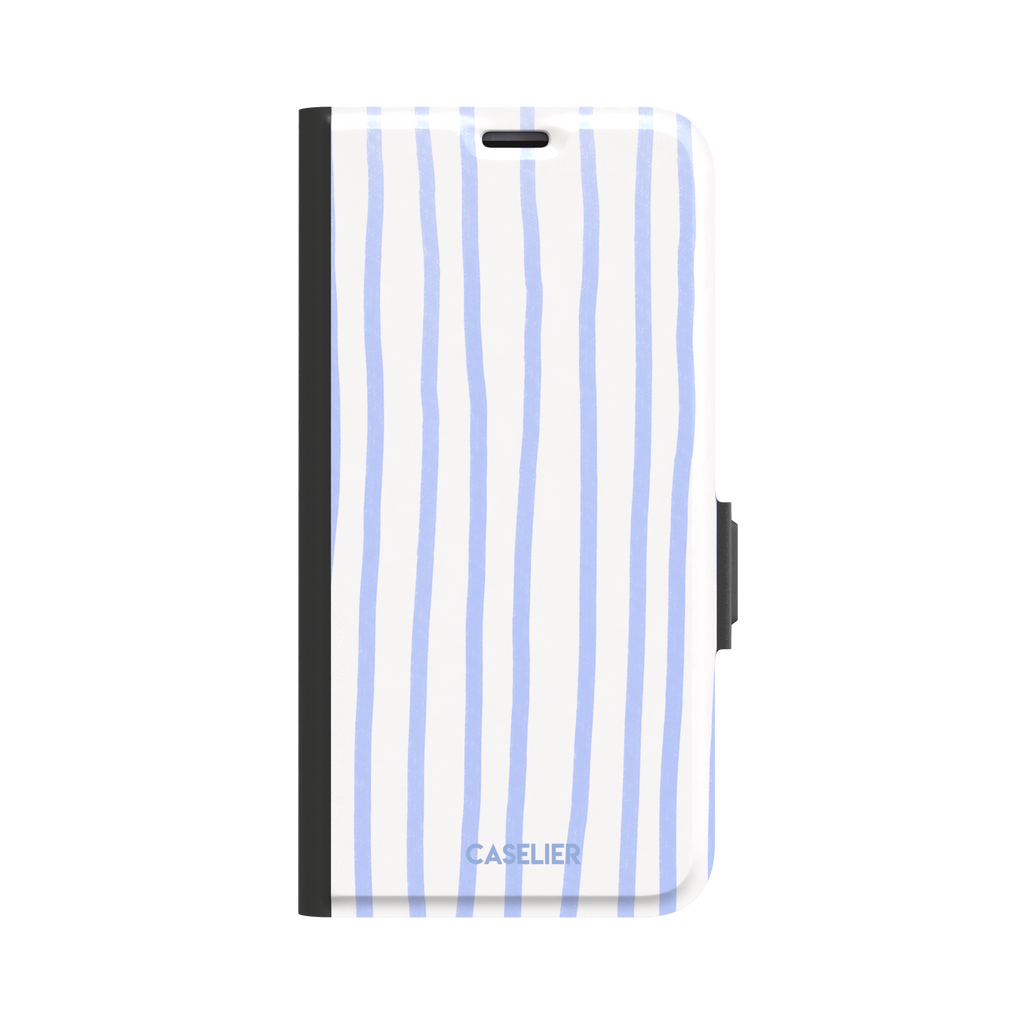 Beach Towel phone case in periwinkle blue and white wavy vertical stripes on iPhone, phone case by Caselier — wallet case, front view