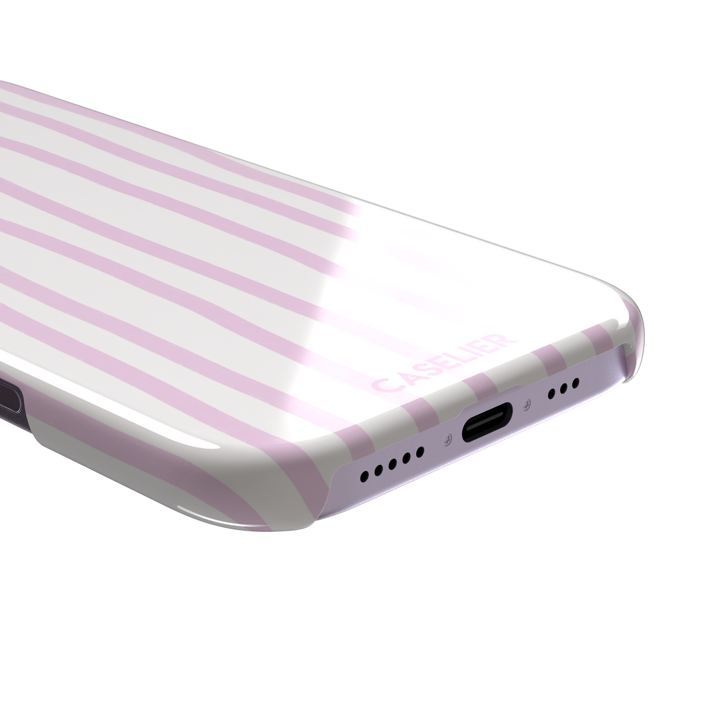 Beach Towel phone case in pink lilac and white wavy vertical stripes color variant on iPhone, phone case by Caselier — snap case, charging port detail
