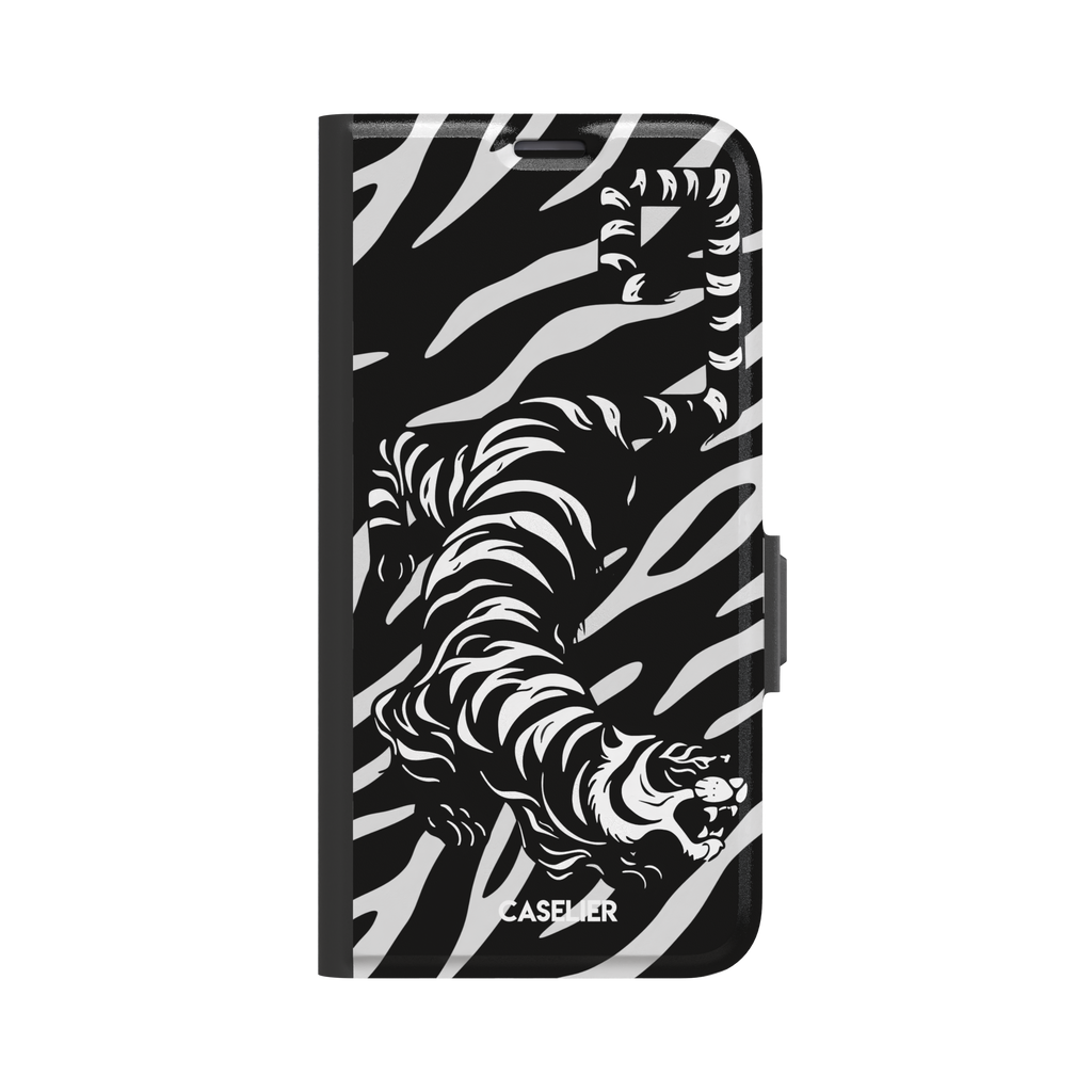 Big Kitty phone case in black — white graphic tiger prowling across a black background with bold stripe patterns, phone case by Caselier — wallet case, front view