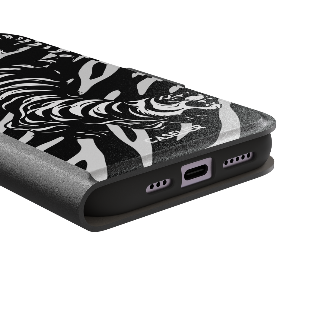 Big Kitty phone case in black — white graphic tiger prowling across a black background with bold stripe patterns, phone case by Caselier — wallet case, charging port detail