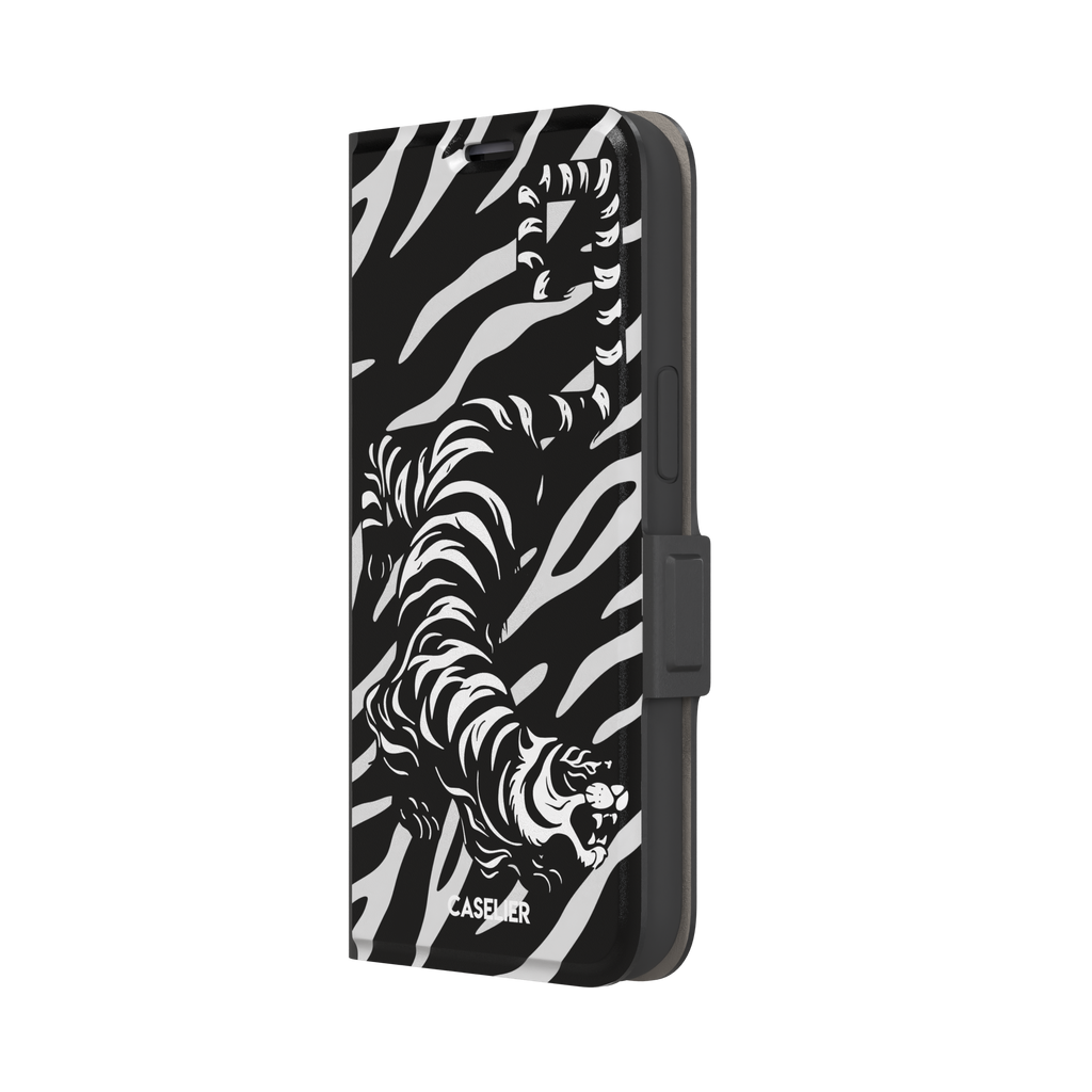 Big Kitty phone case in black — white graphic tiger prowling across a black background with bold stripe patterns, phone case by Caselier — wallet case, right view