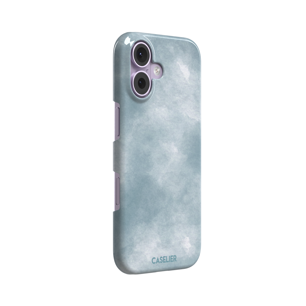 Soft powder-blue watercolor wash phone case with misty white cloud-like blends, phone case by Caselier — snap case, left view