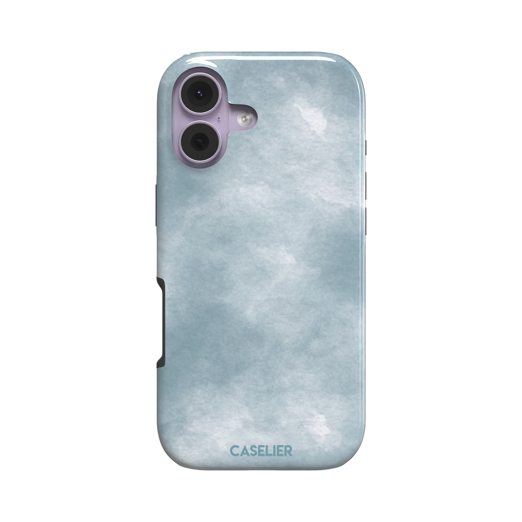 Soft powder-blue watercolor wash phone case with misty white cloud-like blends, phone case by Caselier — tough case, front view
