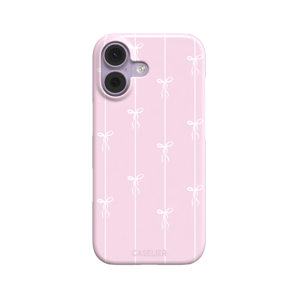 Bows on String phone case in pale pink with white bow and stripe repeat pattern, phone case by Caselier — snap case, front view