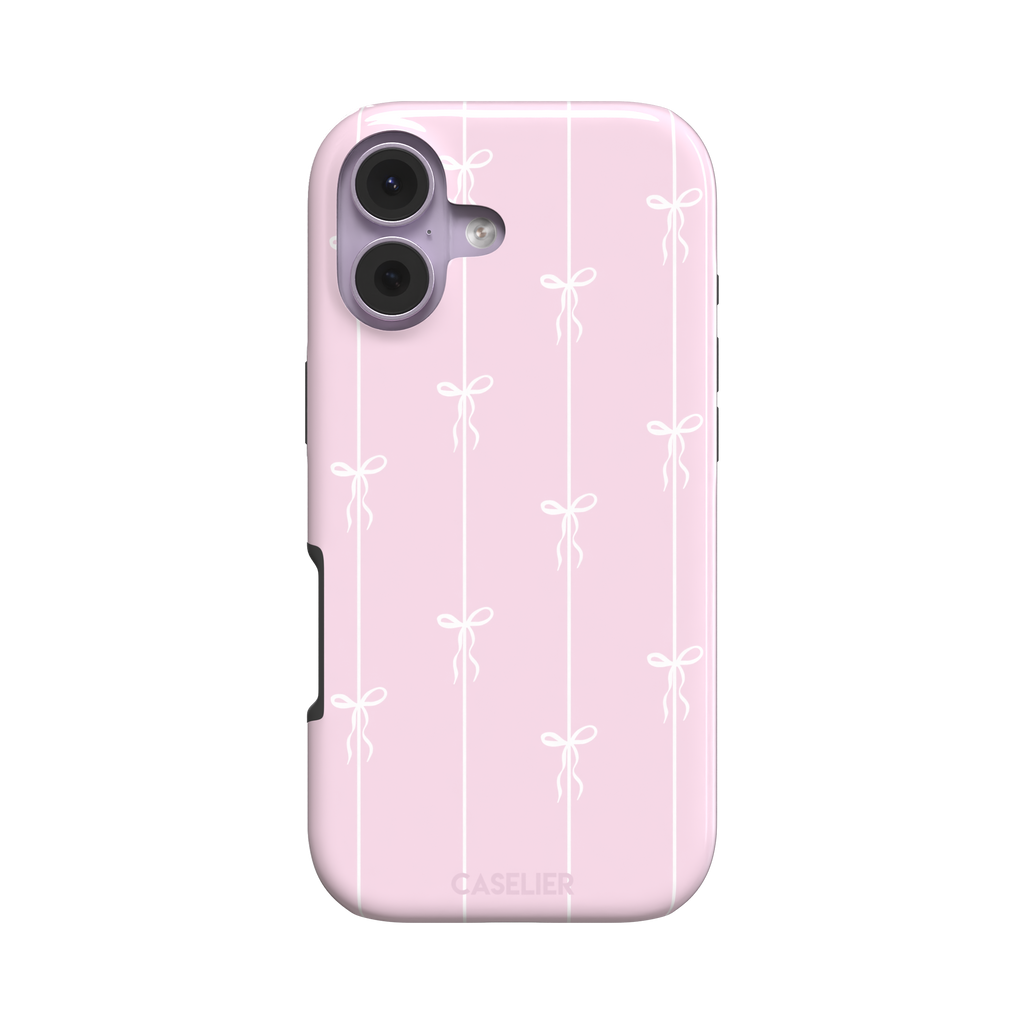 Bows on String phone case in pale pink with white bow and stripe repeat pattern, phone case by Caselier — tough case, front view