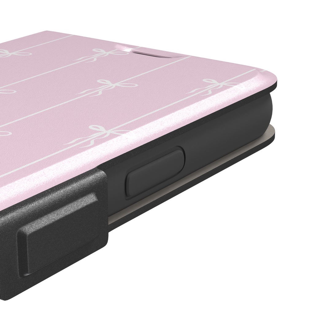Bows on String phone case in pale pink with white bow and stripe repeat pattern, phone case by Caselier — wallet case, volume buttons detail
