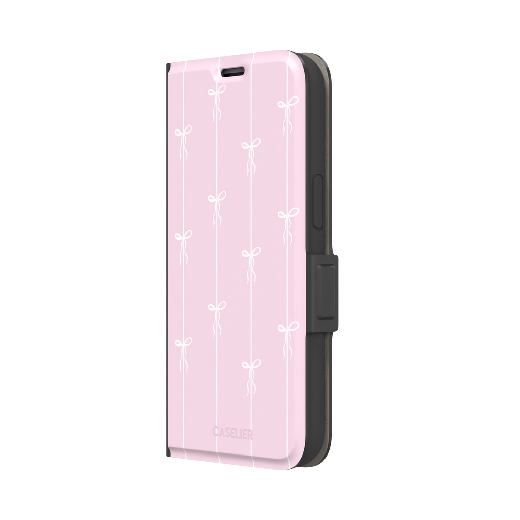 Bows on String phone case in pale pink with white bow and stripe repeat pattern, phone case by Caselier — wallet case, right view