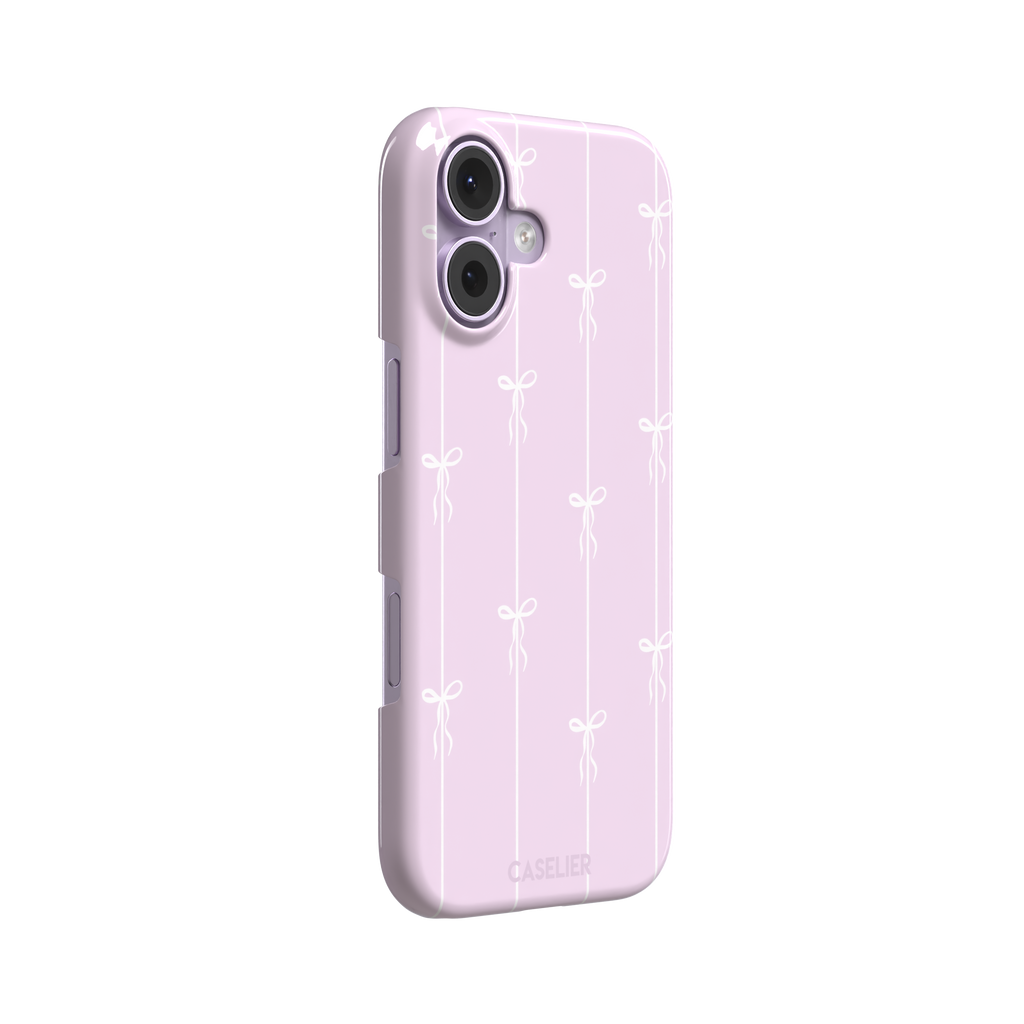 Bows on String phone case in soft lilac pink with white ribbon bows on vertical stripes, phone case by Caselier — snap case, left view