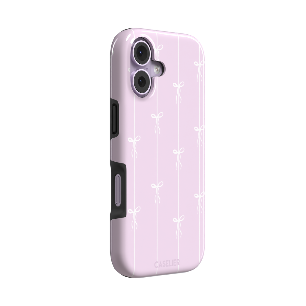 Bows on String phone case in soft lilac pink with white ribbon bows on vertical stripes, phone case by Caselier — tough case, left view