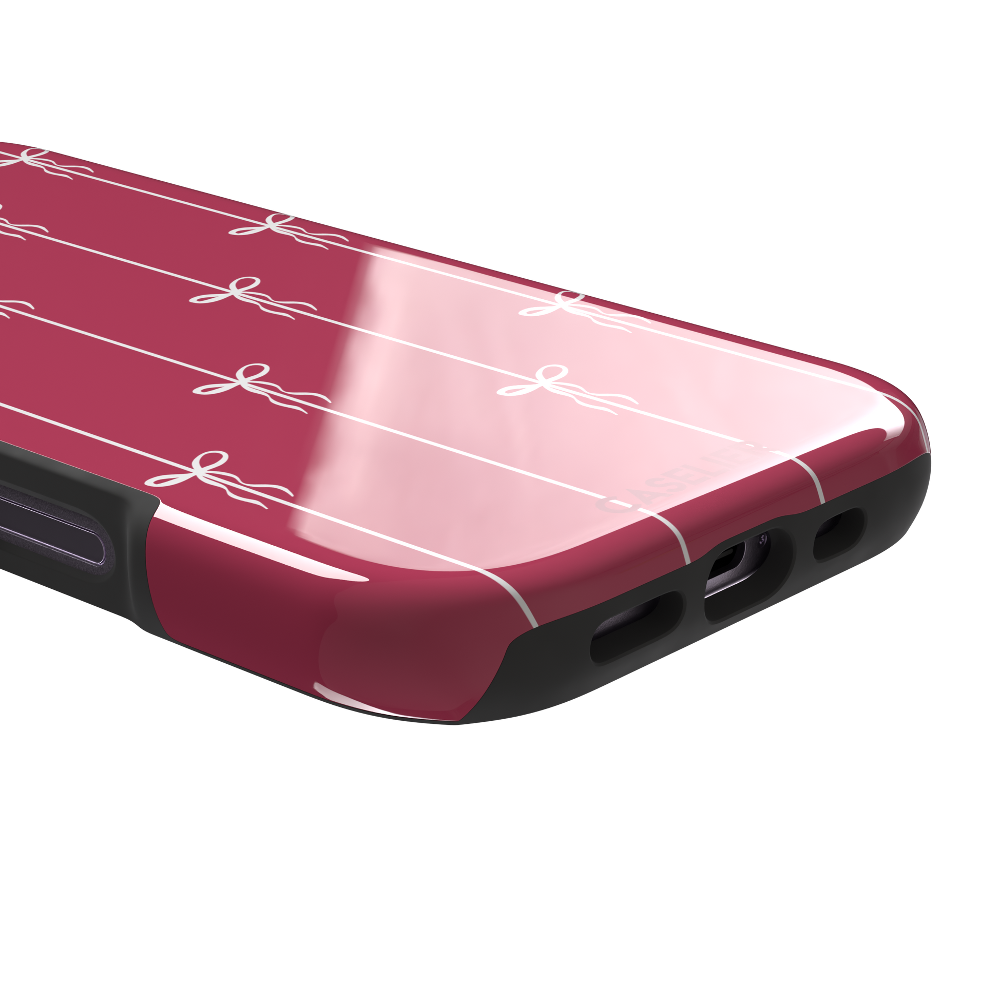 Bows on String phone case in raspberry pink with white ribbon bows tied along vertical stripes, phone case by Caselier — tough case, charging port detail
