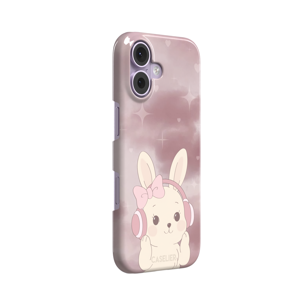 Bunnie-Boo phone case in soft pink featuring a kawaii cream bunny with pink headphones and a bow against a sparkly rose sky with hearts, phone case by Caselier — snap case, left view
