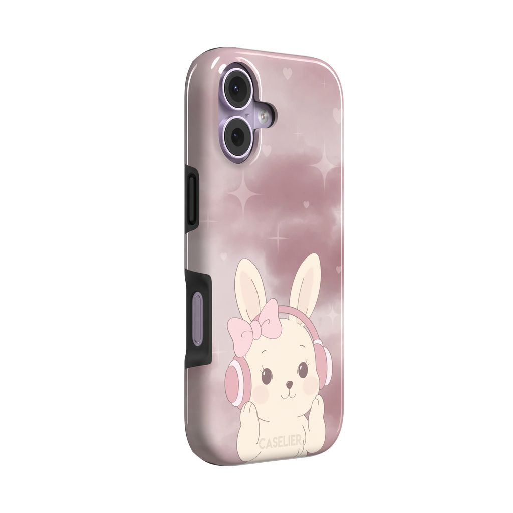 Bunnie-Boo phone case in soft pink featuring a kawaii cream bunny with pink headphones and a bow against a sparkly rose sky with hearts, phone case by Caselier — tough case, left view