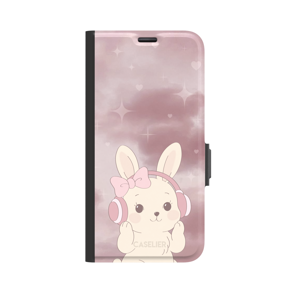 Bunnie-Boo phone case in soft pink featuring a kawaii cream bunny with pink headphones and a bow against a sparkly rose sky with hearts, phone case by Caselier — wallet case, front view