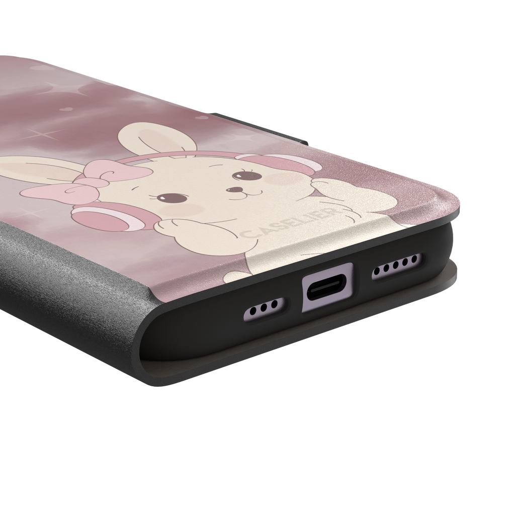 Bunnie-Boo phone case in soft pink featuring a kawaii cream bunny with pink headphones and a bow against a sparkly rose sky with hearts, phone case by Caselier — wallet case, charging port detail