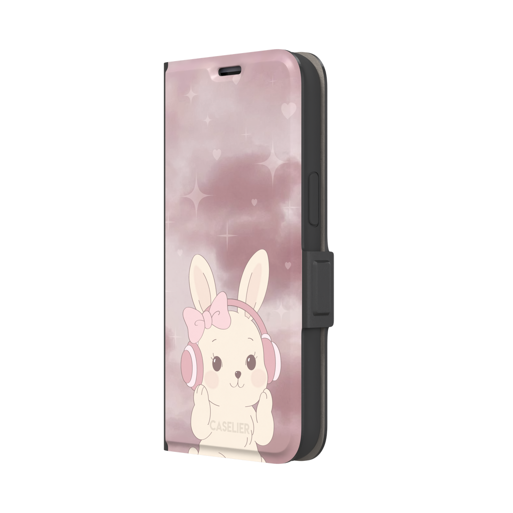 Bunnie-Boo phone case in soft pink featuring a kawaii cream bunny with pink headphones and a bow against a sparkly rose sky with hearts, phone case by Caselier — wallet case, right view