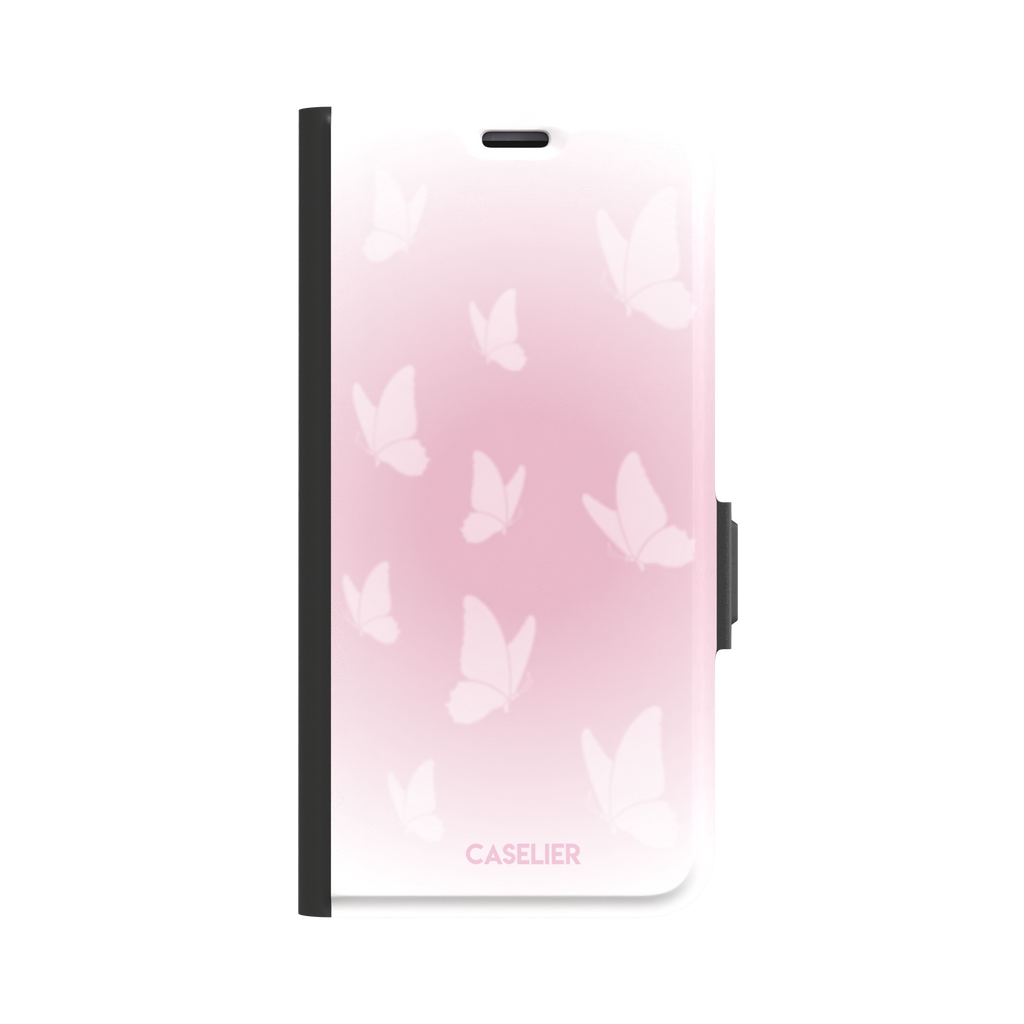 Butterflies phone case with soft pink gradient and scattered white butterfly silhouettes in a coquette style, phone case by Caselier — wallet case, front view