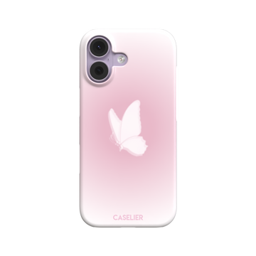Butterfly phone case with a soft white butterfly silhouette on a blush pink gradient background, Coquette collection phone case by Caselier — snap case, front view