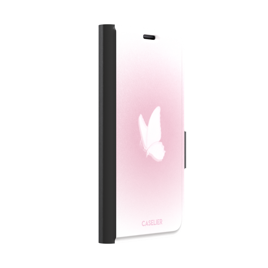 Butterfly phone case with a soft white butterfly silhouette on a blush pink gradient background, Coquette collection phone case by Caselier — wallet case, left view