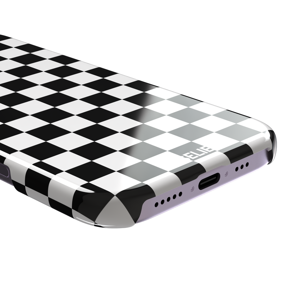 Checkered phone case in classic black and white checkerboard pattern, phone case by Caselier — snap case, charging port detail