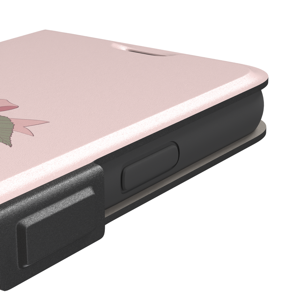 Soft pink phone case featuring two glossy red cherries tied with a pink ribbon bow and green leaf illustration in a coquette style, phone case by Caselier — wallet case, volume buttons detail