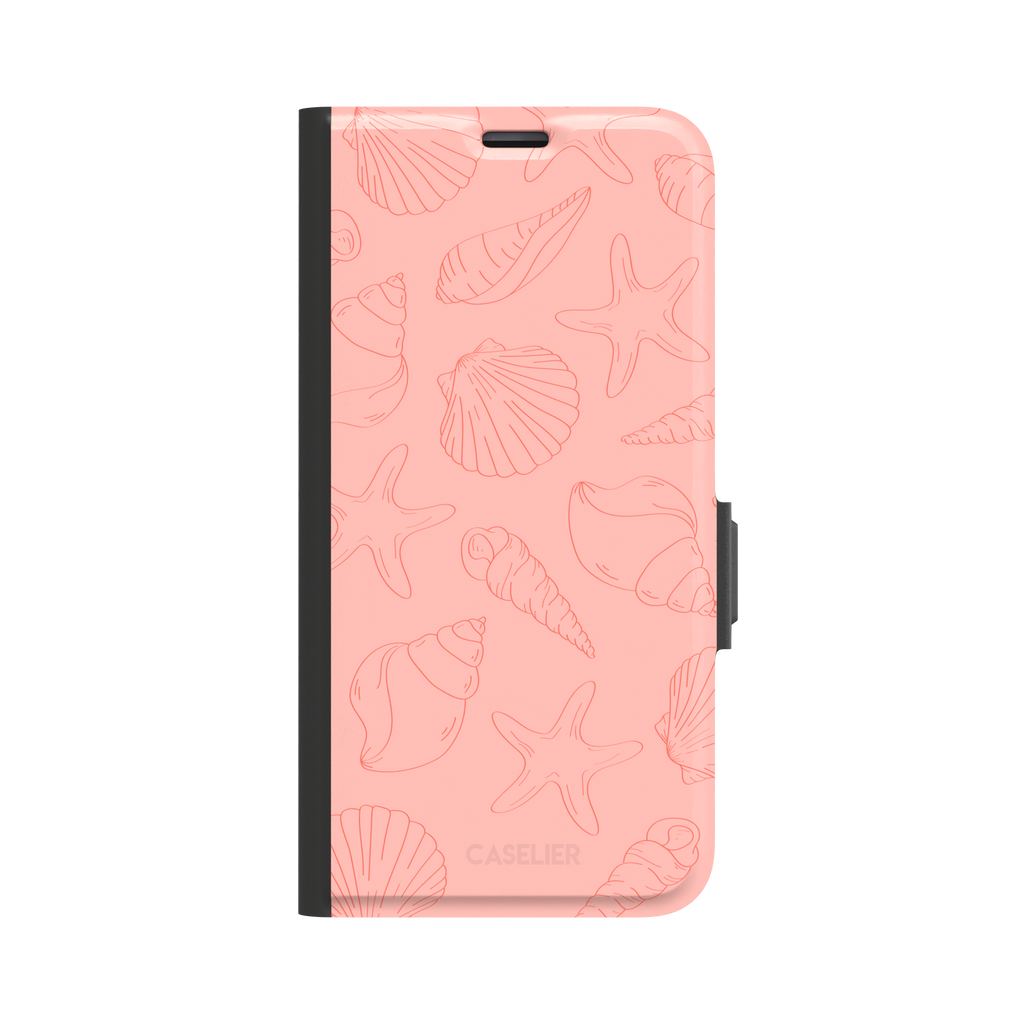 Coquillages coral pink phone case featuring an all-over tonal line-art pattern of seashells, conch spirals, starfish and scallops, by Caselier — wallet case, front view