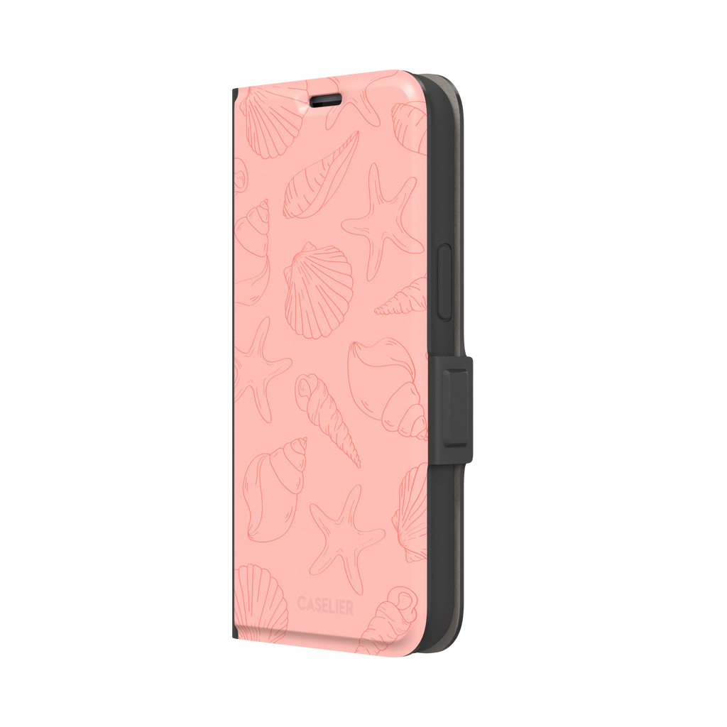 Coquillages coral pink phone case featuring an all-over tonal line-art pattern of seashells, conch spirals, starfish and scallops, by Caselier — wallet case, right view