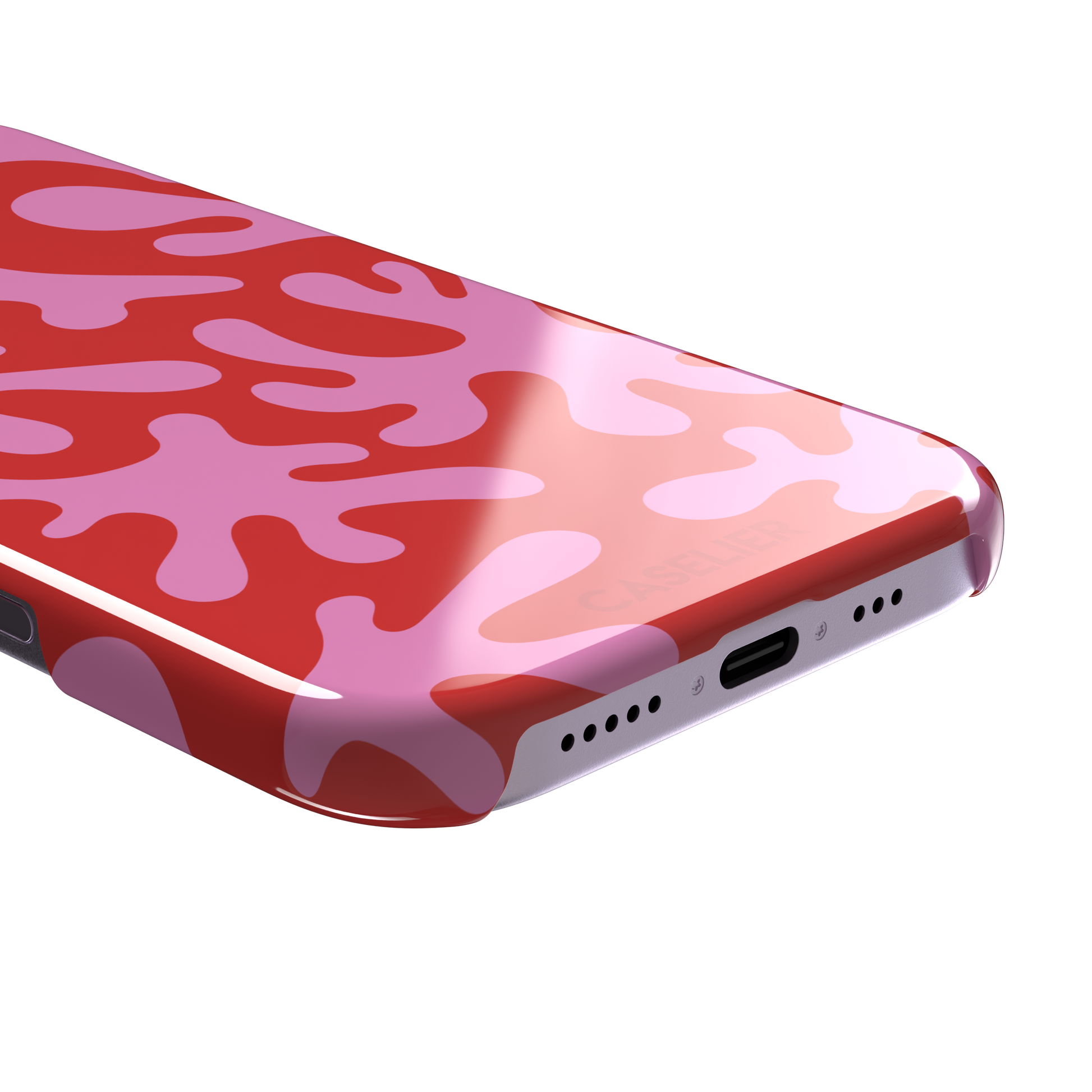 Coral Reef phone case in red and bubblegum pink with an all-over branching coral abstract pattern, phone case by Caselier — snap case, charging port detail
