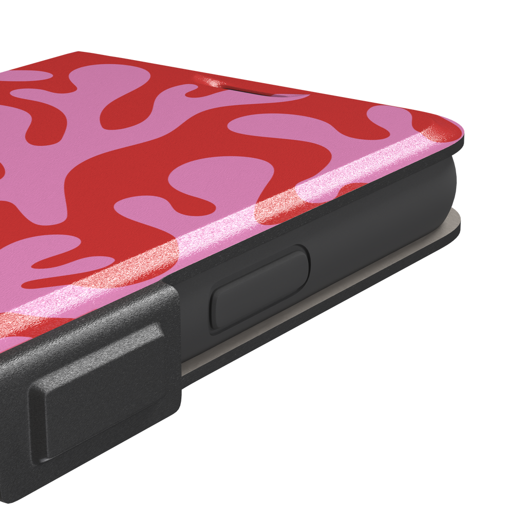 Coral Reef phone case in red and bubblegum pink with an all-over branching coral abstract pattern, phone case by Caselier — wallet case, volume buttons detail