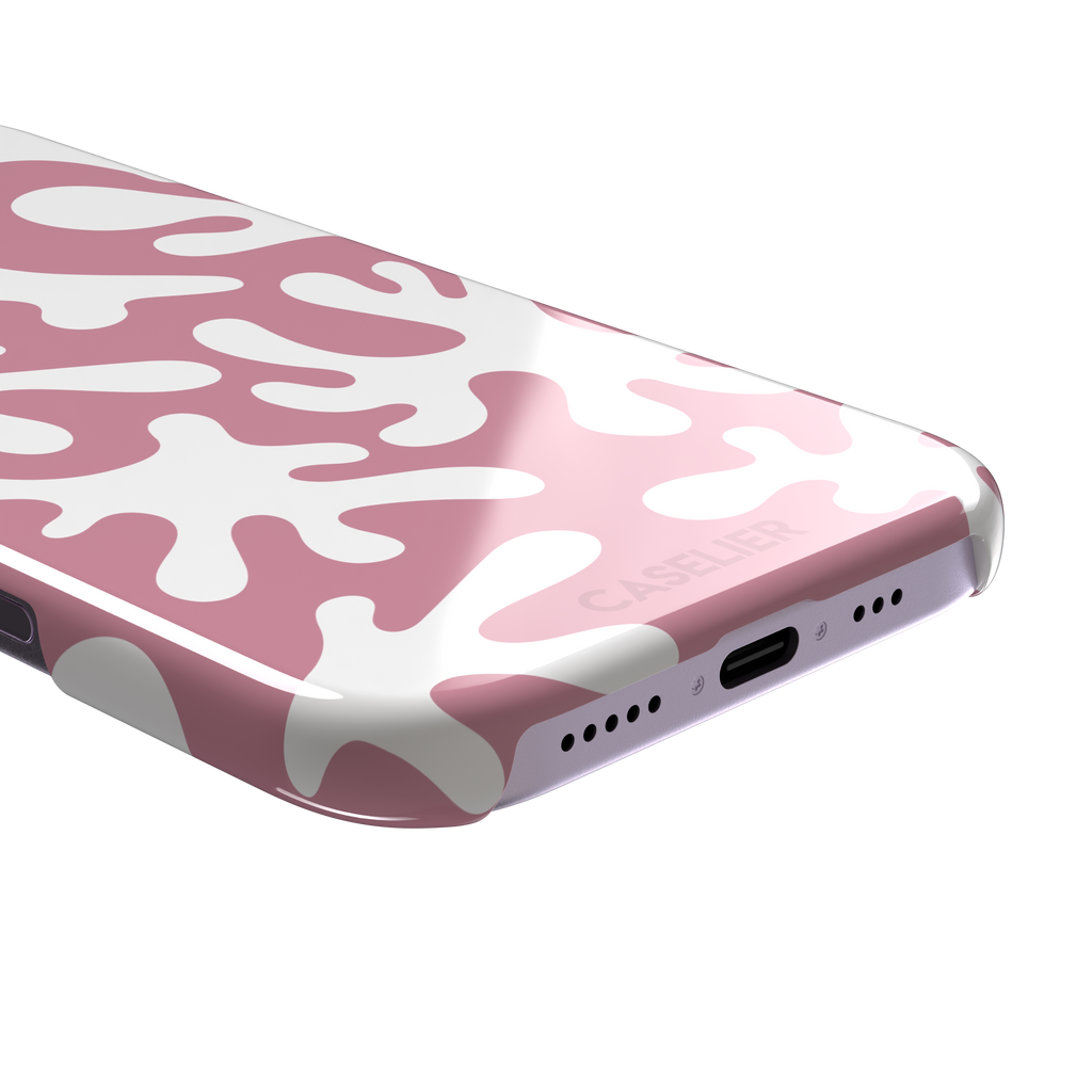 Coral Reef phone case in dusty pink and white with an all-over branching coral abstract pattern, phone case by Caselier — snap case, charging port detail