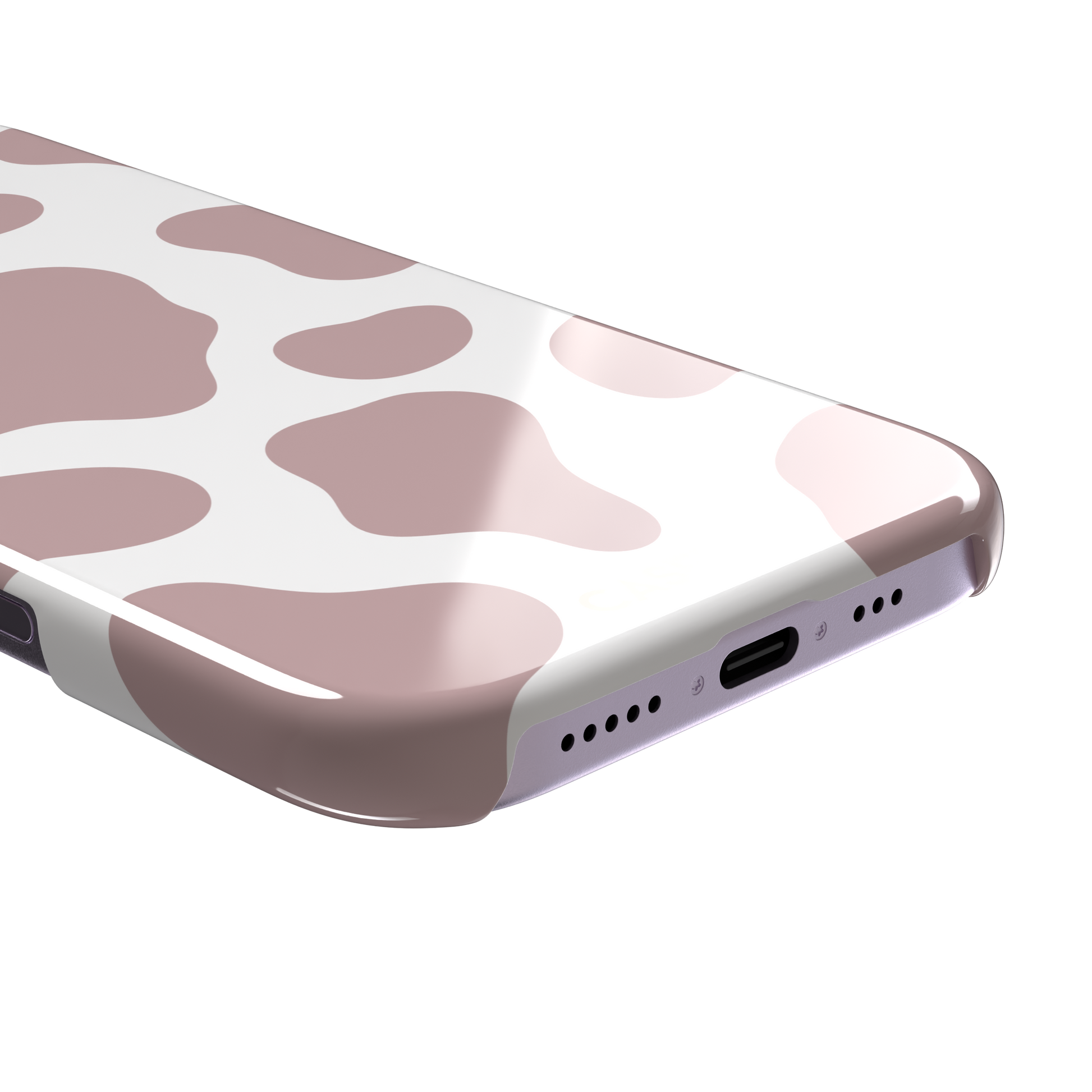 Cow print phone case in dusty rose pink and white with large soft-edged spots across the full back, phone case by Caselier — snap case, charging port detail