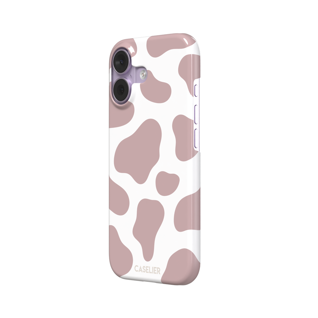 Cow print phone case in dusty rose pink and white with large soft-edged spots across the full back, phone case by Caselier — snap case, right view