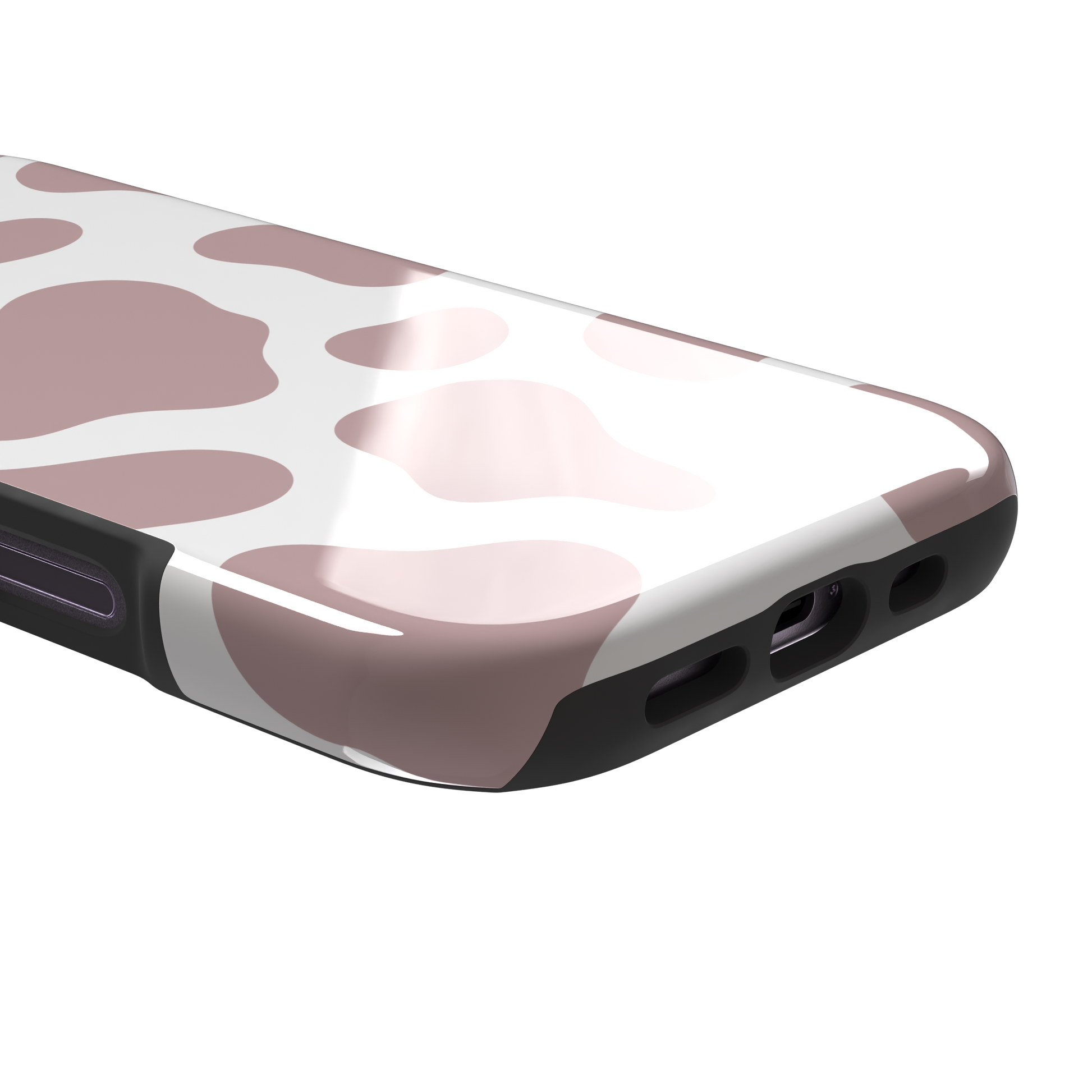 Cow print phone case in dusty rose pink and white with large soft-edged spots across the full back, phone case by Caselier — tough case, charging port detail