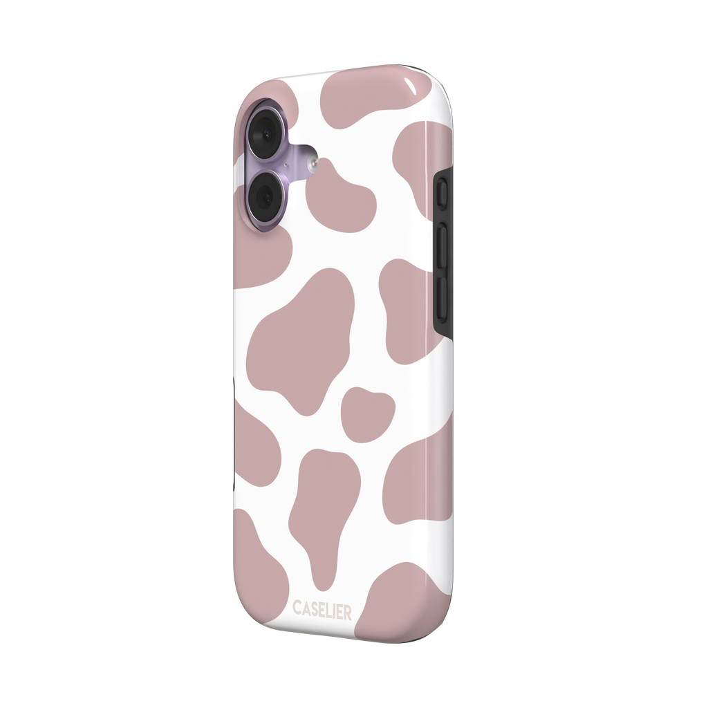 Cow print phone case in dusty rose pink and white with large soft-edged spots across the full back, phone case by Caselier — tough case, right view