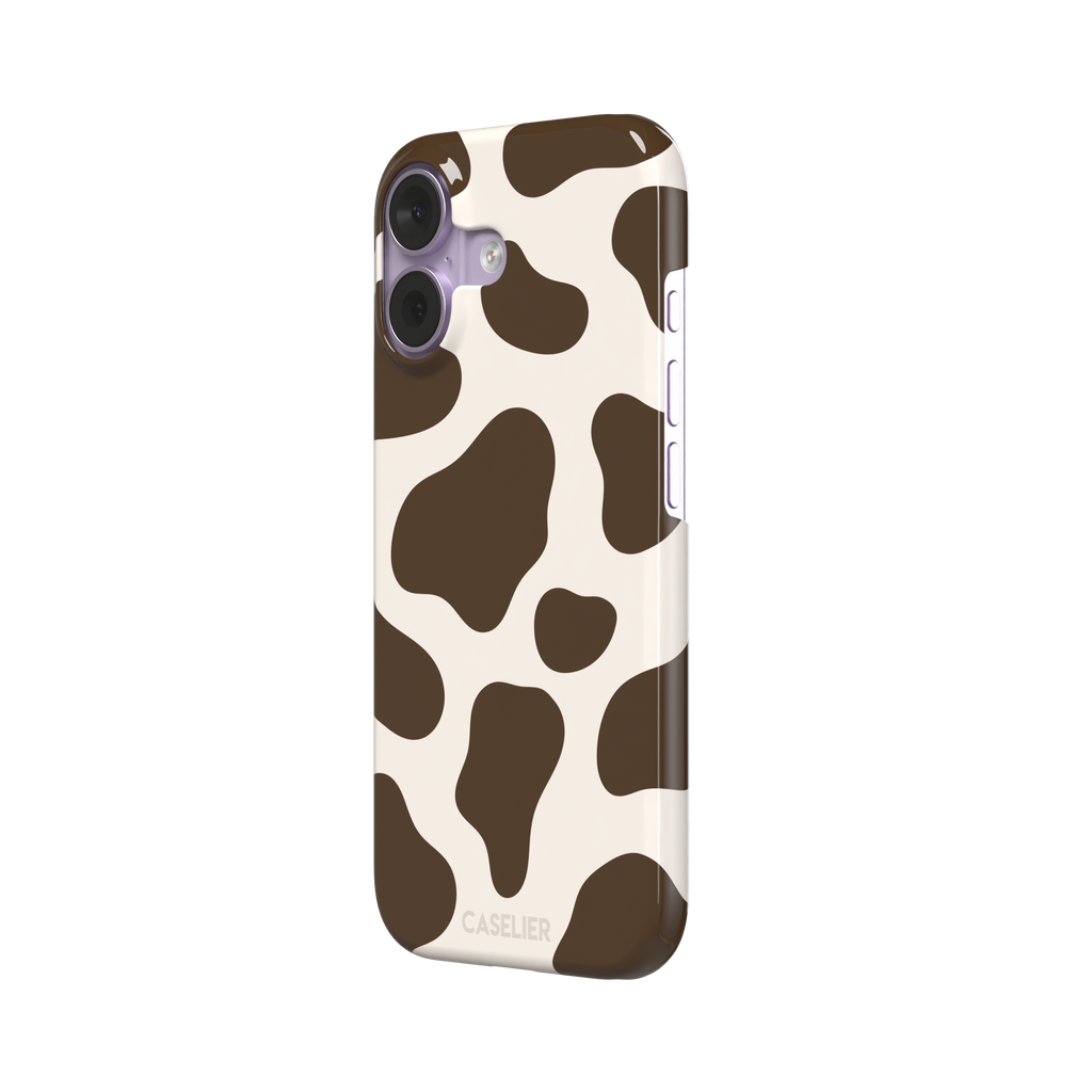 Cow print phone case in deep brown and cream with large irregular spots covering the full back, phone case by Caselier — snap case, right view