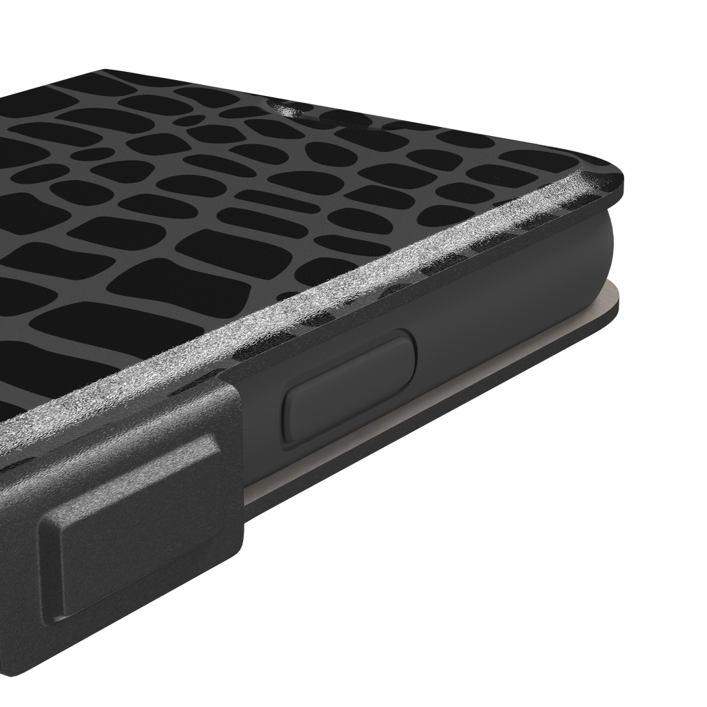 Crocodile phone case in black and dark grey croc-scale pattern, phone case by Caselier — wallet case, volume buttons detail