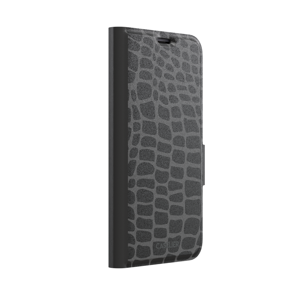 Crocodile phone case in black and dark grey croc-scale pattern, phone case by Caselier — wallet case, left view