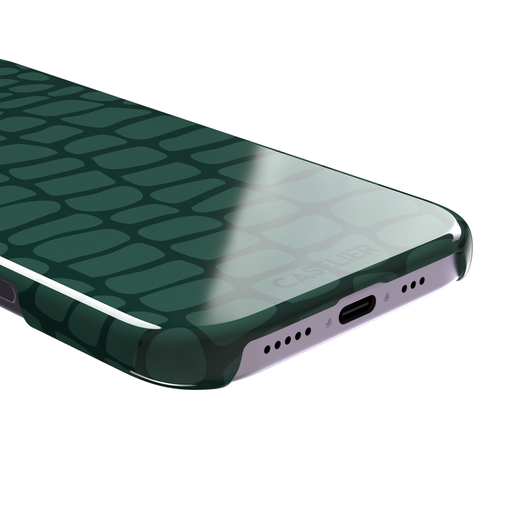 Crocodile phone case in forest green tonal croc-scale pattern, phone case by Caselier — snap case, charging port detail