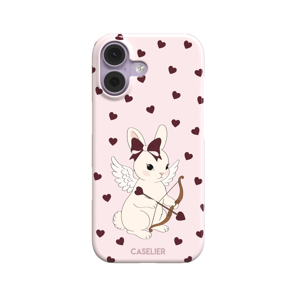 Blush pink phone case featuring a winged white cupid bunny with a burgundy bow and arrow surrounded by dark red hearts, phone case by Caselier — snap case, front view