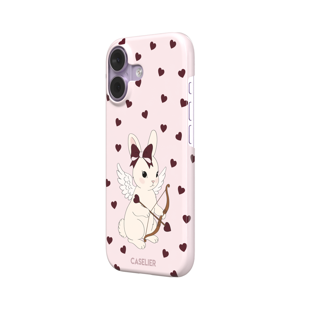 Blush pink phone case featuring a winged white cupid bunny with a burgundy bow and arrow surrounded by dark red hearts, phone case by Caselier — snap case, right view