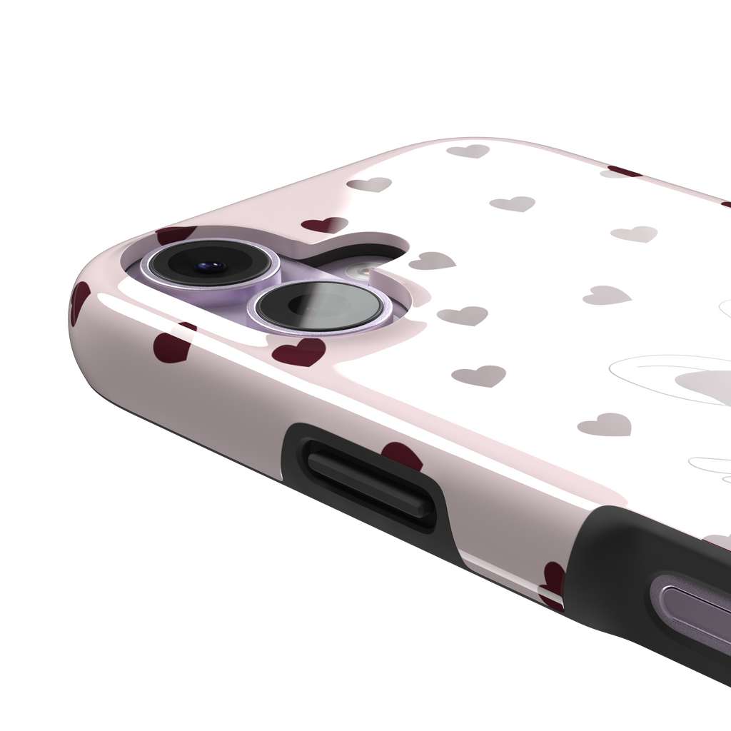 Blush pink phone case featuring a winged white cupid bunny with a burgundy bow and arrow surrounded by dark red hearts, phone case by Caselier — tough case, volume buttons detail