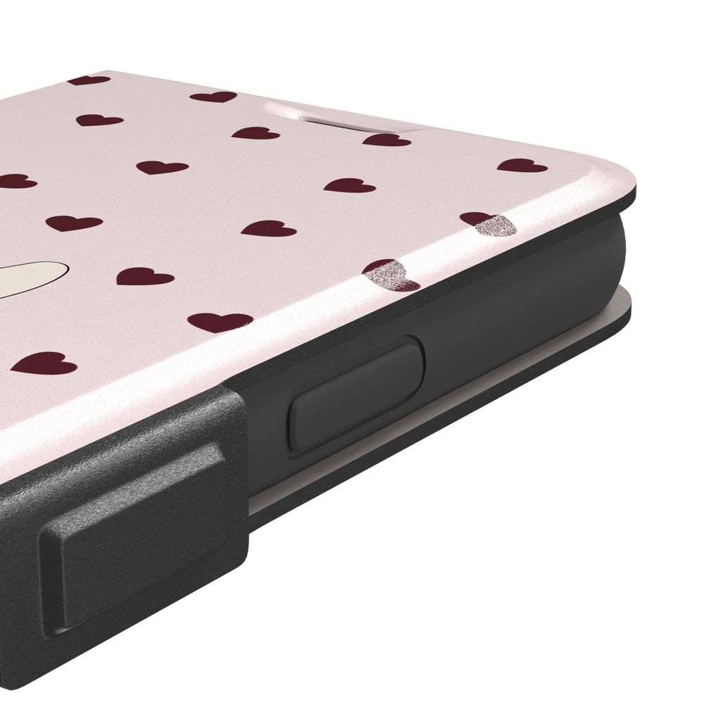 Blush pink phone case featuring a winged white cupid bunny with a burgundy bow and arrow surrounded by dark red hearts, phone case by Caselier — wallet case, volume buttons detail